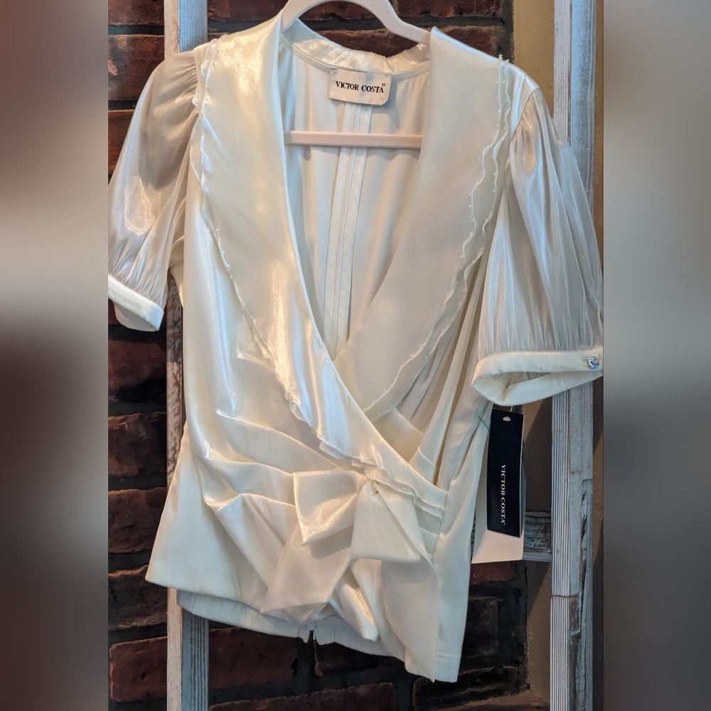 Size 4 satin top. New with tags.